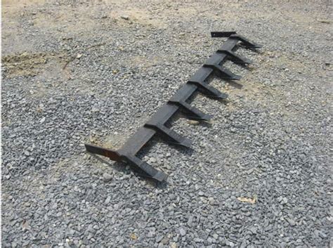 tooth bar for skid steer loader